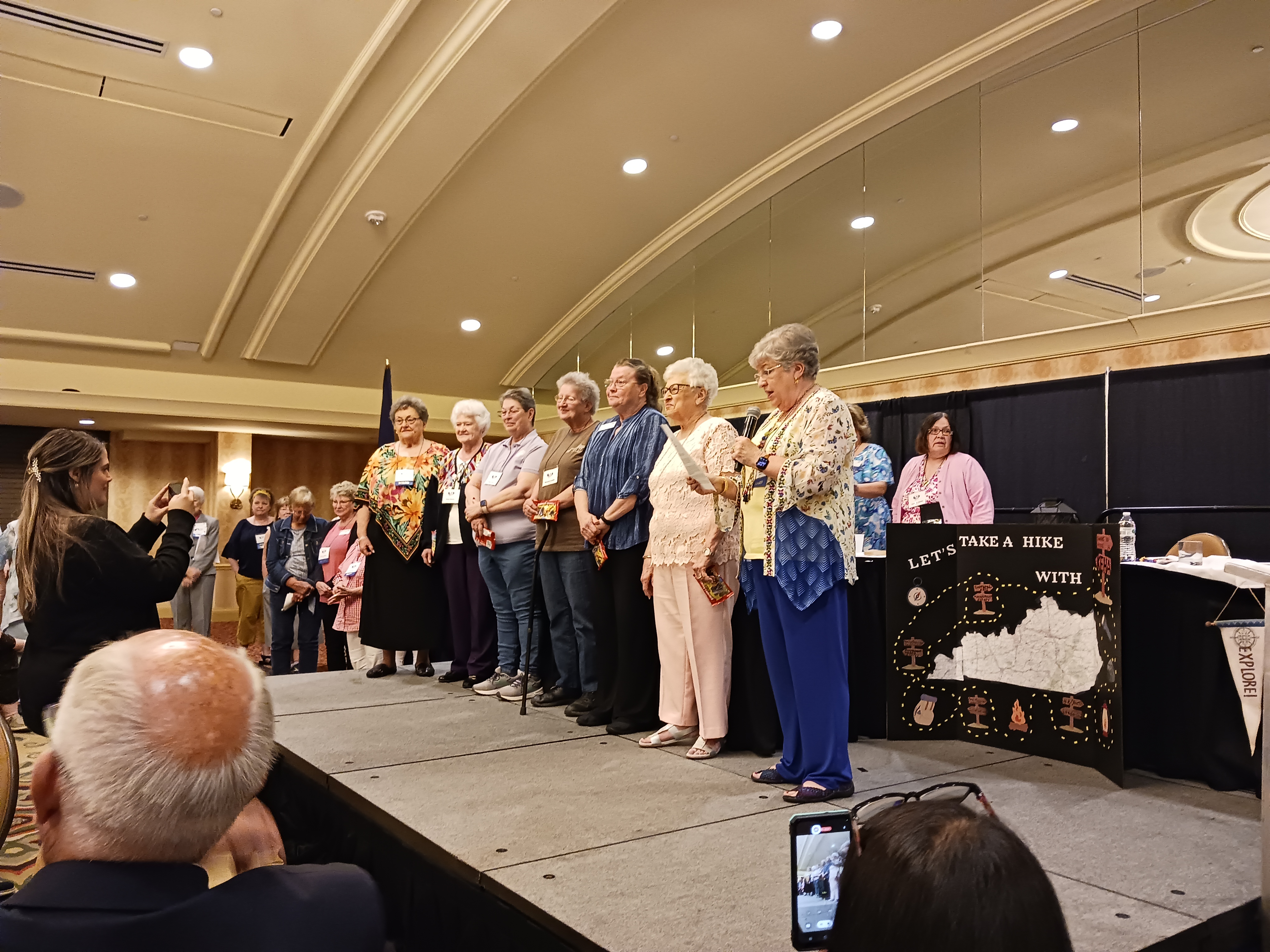 Past president Karen Hill, standing on the right, installed the KEHA officers who were elected during the 2023 KEHA State Meeting business meeting. Their new terms begin July 1.