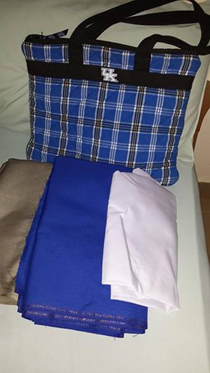 Fabric purchased at the Koforidua market for sewing school uniforms