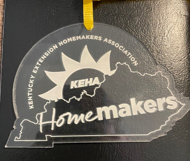 KEHA Ornament - Clear in shape of Kentucky with the letters KEHA